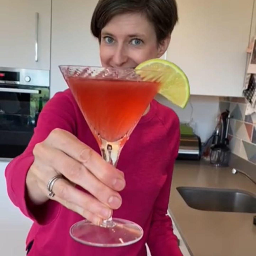 Bethan drinking a Get Up & Glow inspired Hibiscus Daiquiri