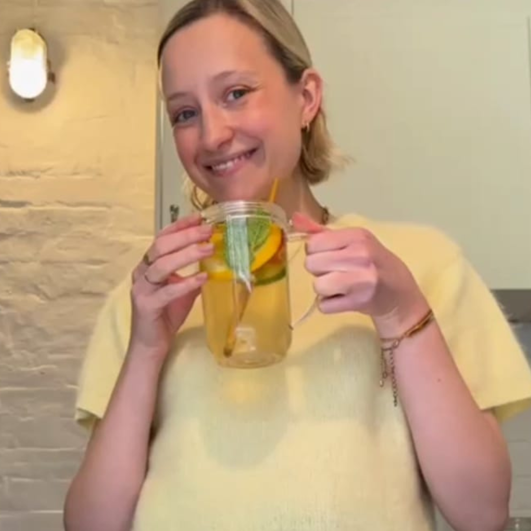 Lauren drinking Morning Rescue Pimms mocktail