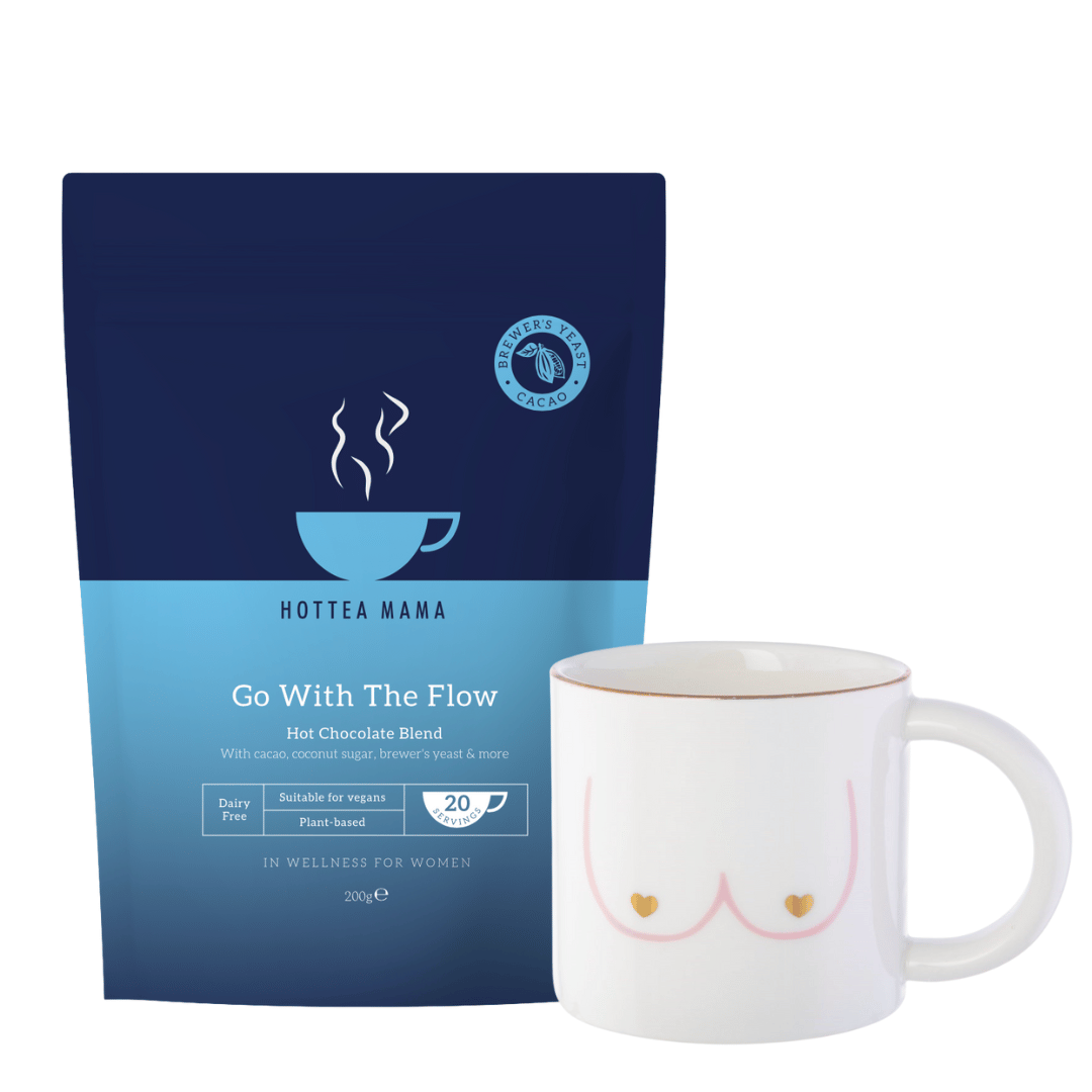 HOTTEA MAMA Go With The Flow hot chocolate blend package and a white Sass & Belle Girl Power mug on a white background