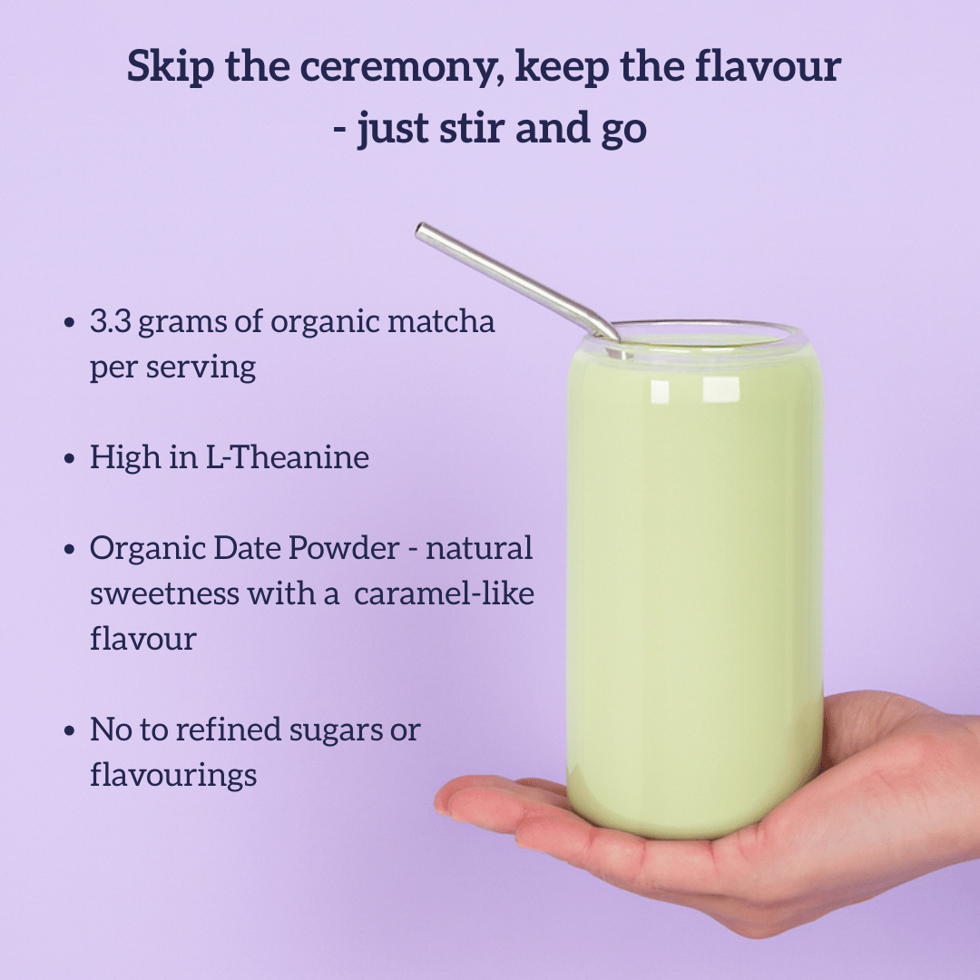 Hand holding a cup of Mind Over Matcha with a straw against a purple background, featuring text about the ingredients and benefits.