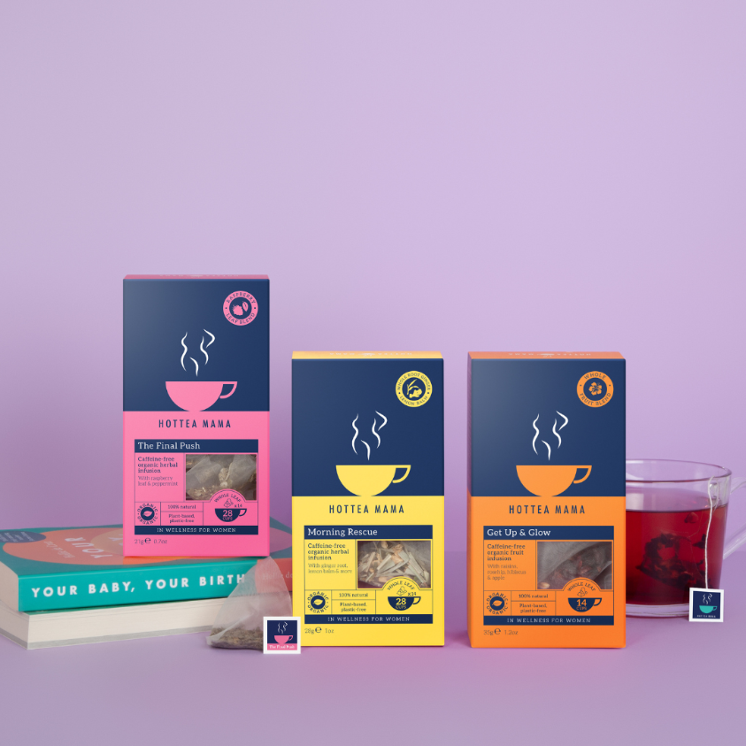 Shot of 3 HotTea Mama teas on a lilac background, including The Final Push Raspberry Leaf tea, organic Get Up & Glow caffeine free blend and Organic Morning Rescue tummy soothing tea blend.