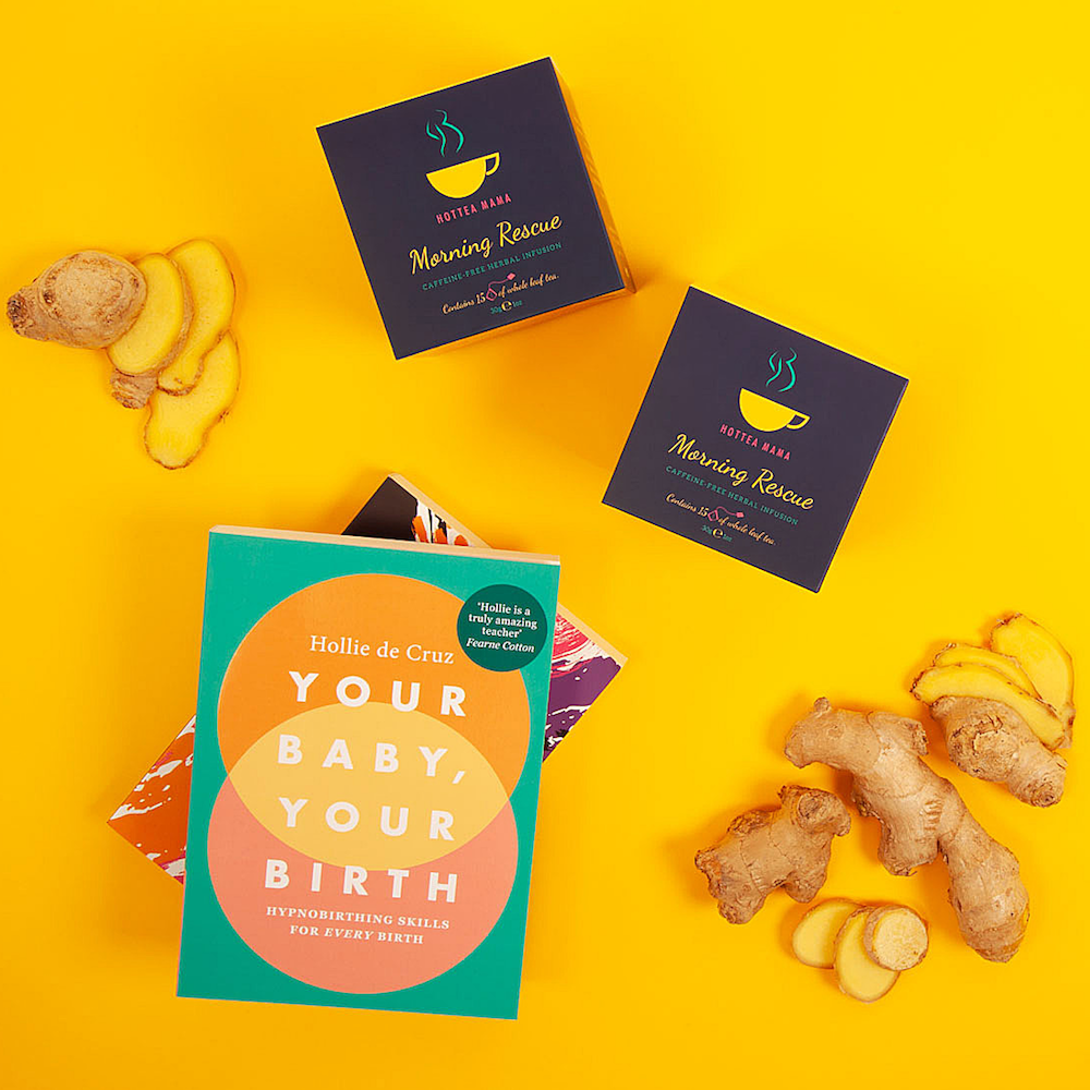 2 boxes of Morning Rescue tea, sliced ginger and a 'your baby, your birth' book on a bright yellow background