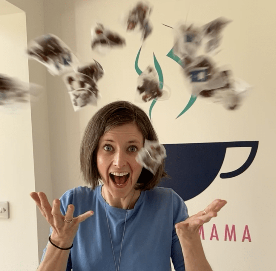 Woman throwing tea bags in the air with HotTea Mama logo in background
