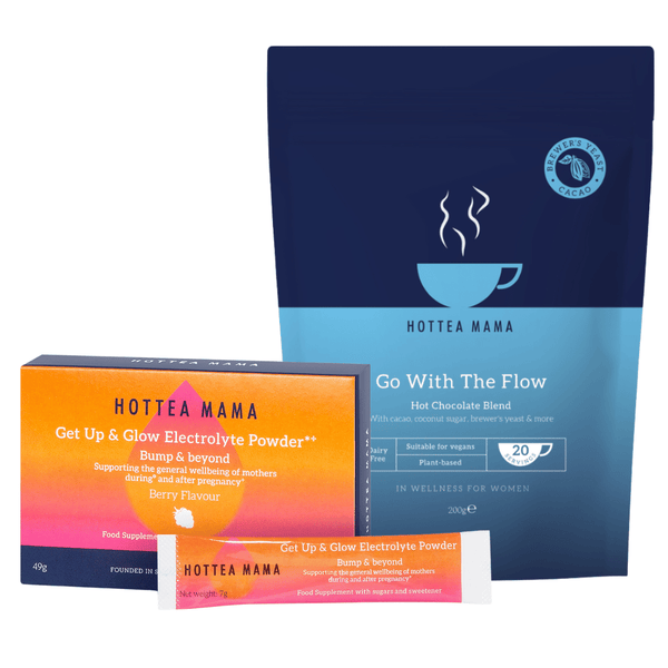 Hottea Mama Get Up & Glow Electrolyte Powder set, featuring a dark blue pouch of Go With The Flow Hot Chocolate Blend, a bright orange and pink box of Berry Flavour powder, and a single stick pack in front.